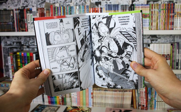 imagem: páginas abertas do volume 1 do mangá Shaman King