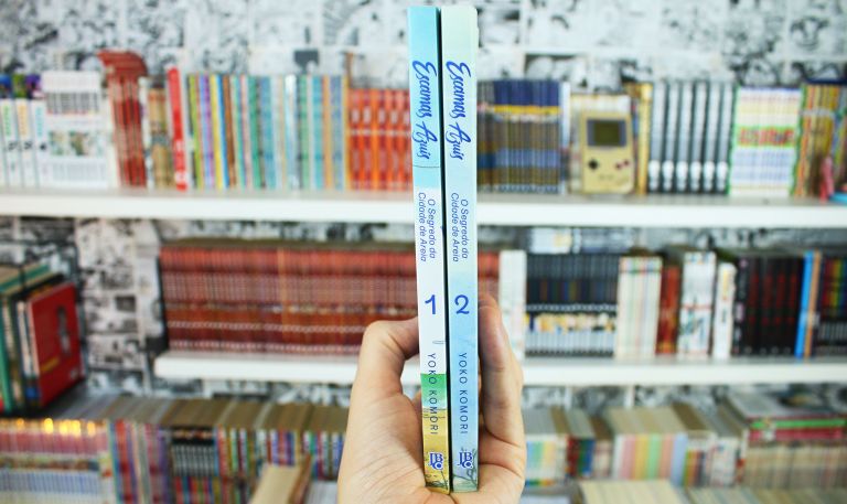 imagem: lombadas dos 2 volumes de Escamas Azuis